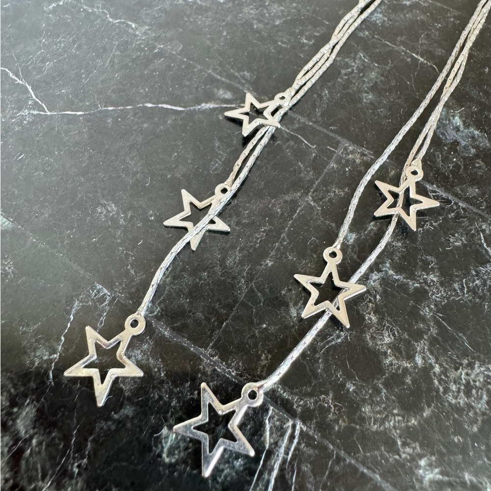 Pair of Silver Dramatic Dangle Star Earrings